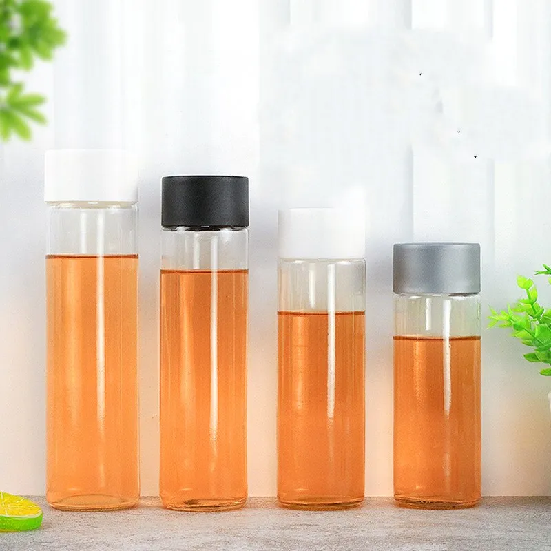 Wholesale emtpy 250ml 300ml 350ml 500ml 750ml 800ml round clear cylinder voss glass water bottle mineral water with screw cap