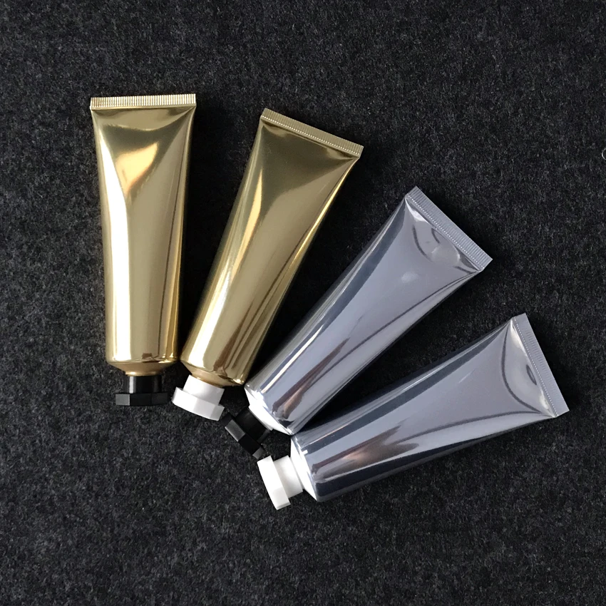 luxury high quality 50ml 100ml shiny soft aluminum plastic tube silver/gold aluminum cream soft tube serum bottle with flip lid