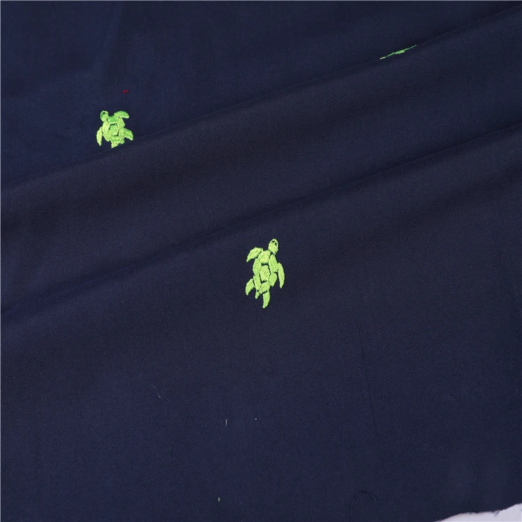 
100% polyester 75D*150D twill microfiber peach skin embroidered beach shorts fabric 