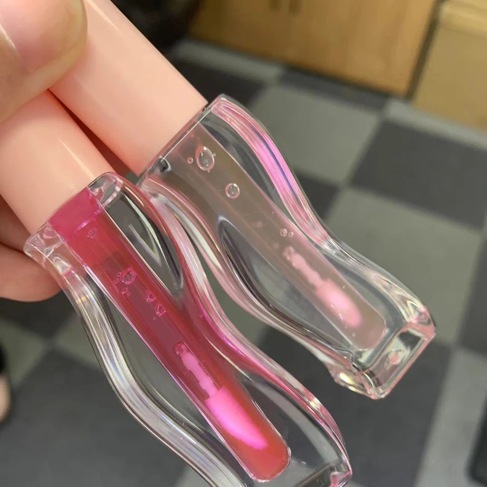 2024 New Product Low Moq Private Label Ph Plumper Lip Tint Fruity Lip Gloss Vegan Magic Pink Color Changing Lip Oil