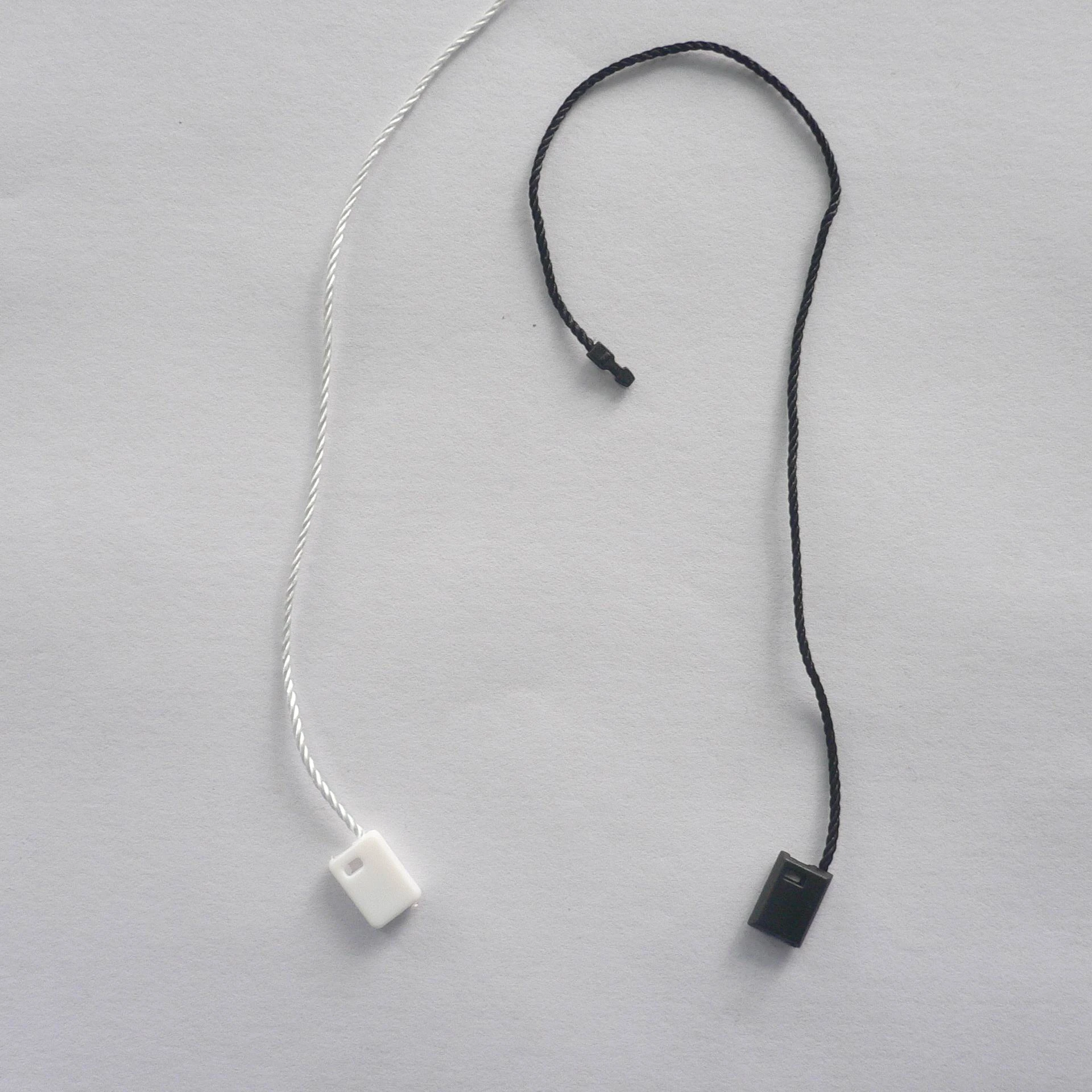 String loop price label combination brand mark product information enhance value easy operate and remove string loop tag pin