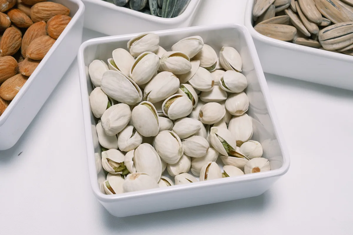 Лучшая распродажа оптовая продажа продукт жареные фисташки орехи продукты