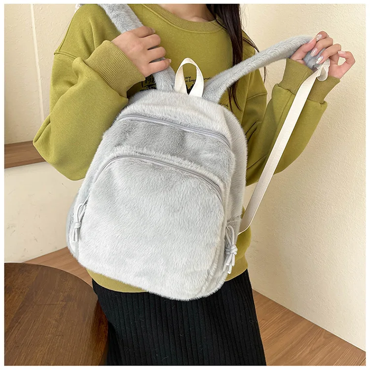 Autumn and winter school bag female plush backpack Korean version high school students solid color simple leisure backpack