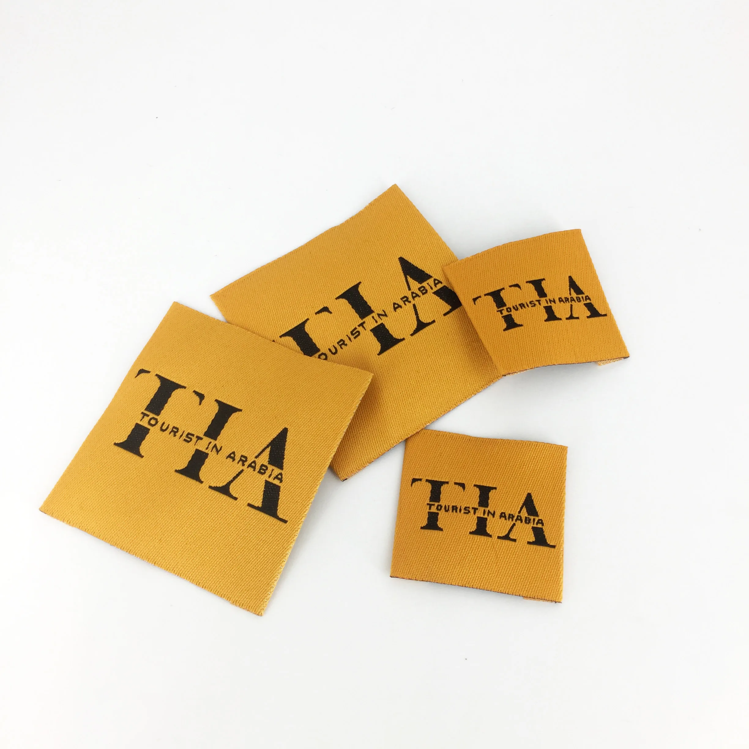 High density fashion design custom logo end fold black label swing on woven care label main tag for clothing socks