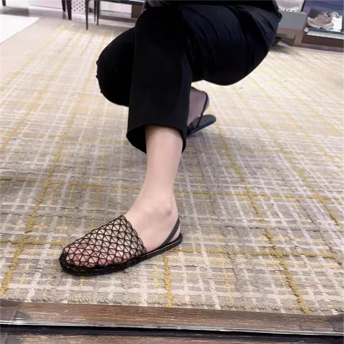 chaussures pour femme fishnet woven hollow Roman sandals female summer new flat bottom round head Mueller slippers
