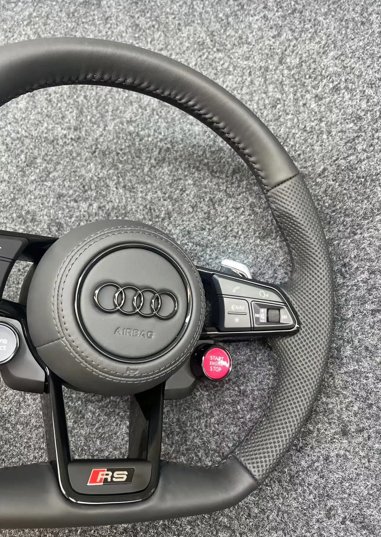 The Audi R8 steering wheel assembly upgrade R8 button sport mode is suitable for all new and old models