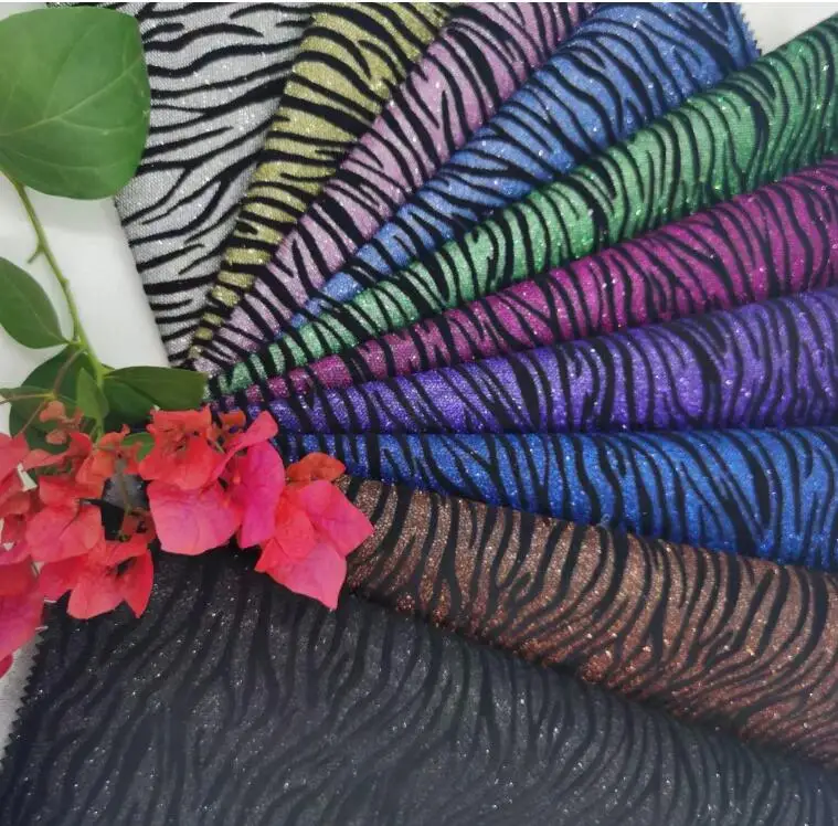 Durable stain resistance waterproof fringe glittered nonwoven fabric for clothing