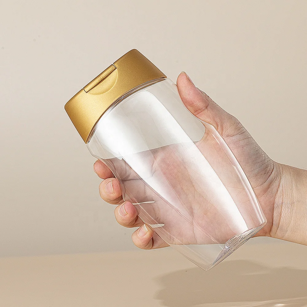 Wholesale plastic transparent honey squeeze bottles plastic bottles for honey packaging honey bottle packaging