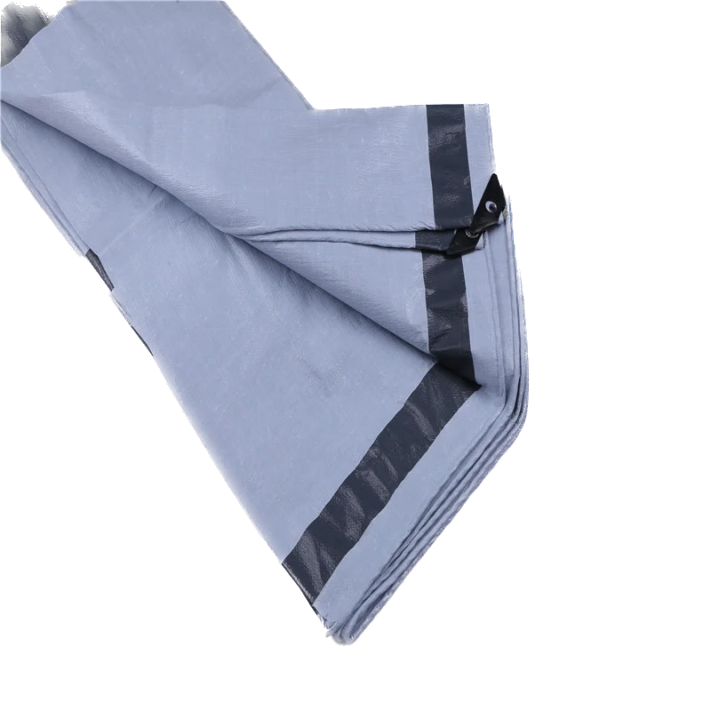 black and white tarpaulin stripped umbrellas