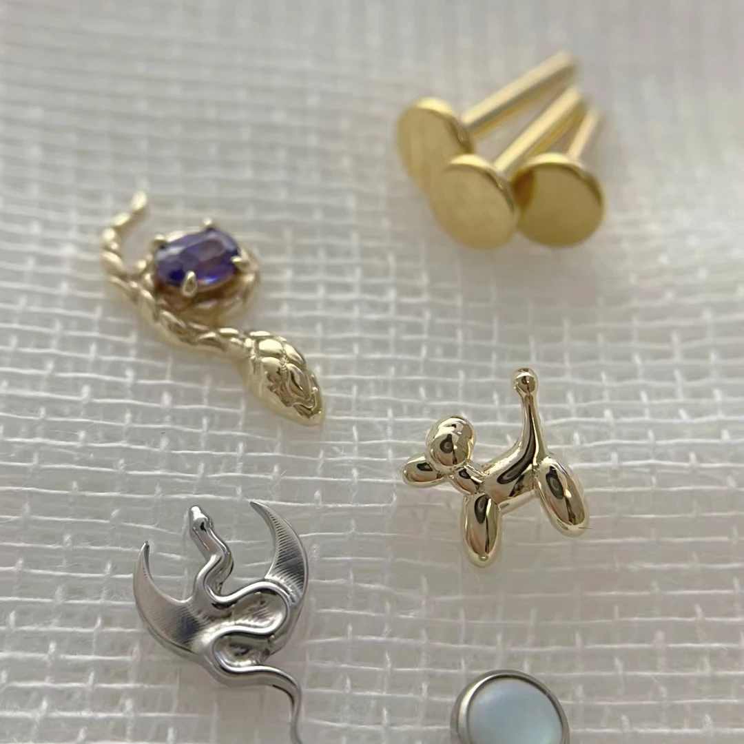 Calendo 2023  New Arrival 14K Karat Fine Solid Gold Threadless Push-in Flat Tops Animal Snake Purple Zircon Piercing Jewelry