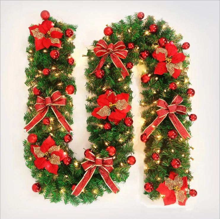 Wholesale Christmas flower bowknot decorated led pre lit artificial christmas garland