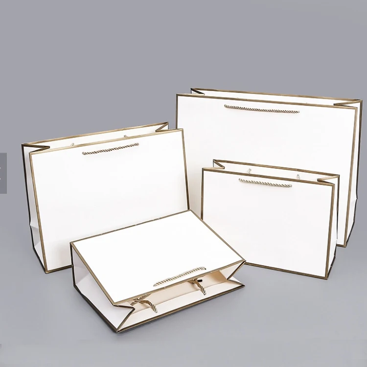 Wholesale Custom Free Design White Paper Shopping Gift Bag For Business Promotion