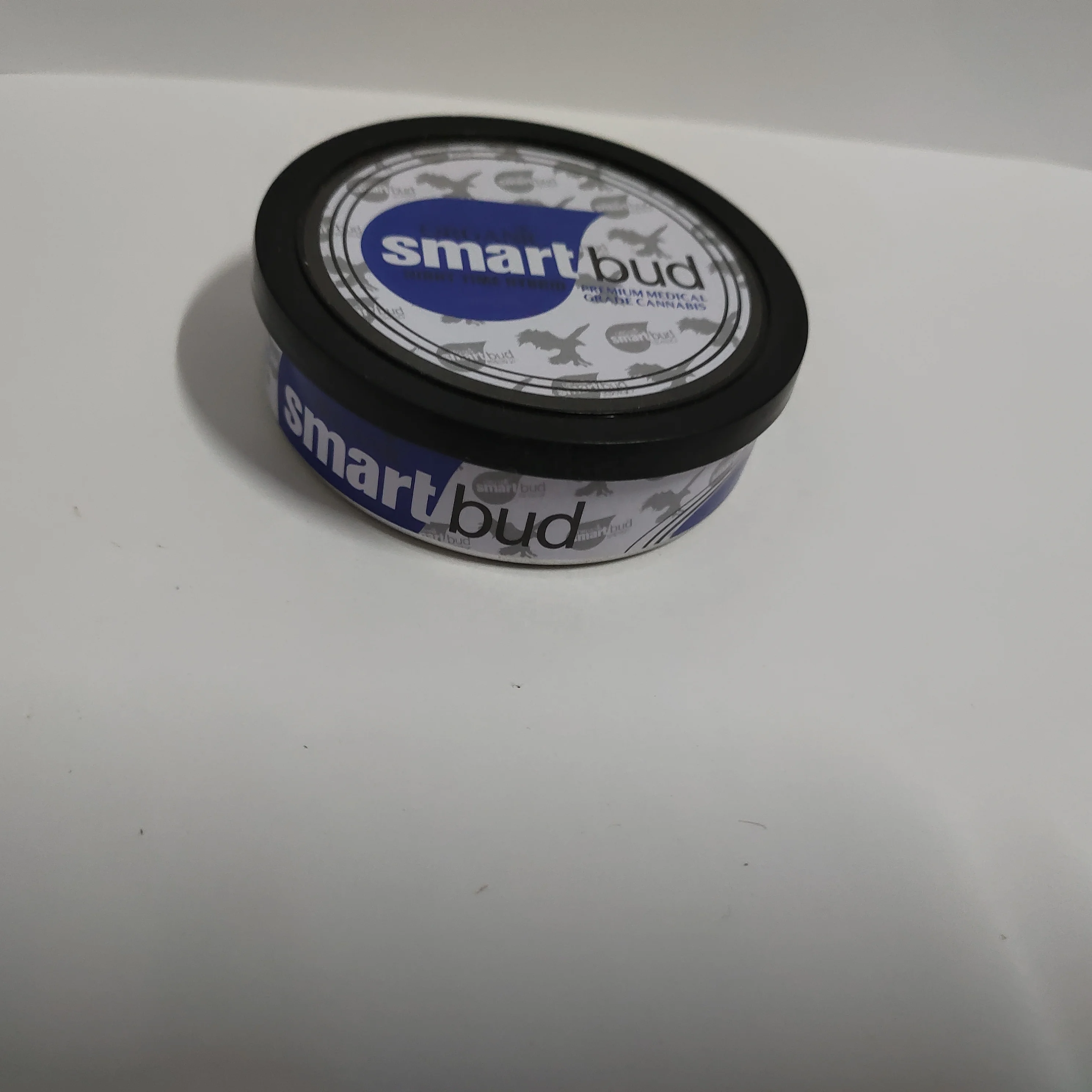 
3.5gram pressitin tin wholesale with clear or black plastic top and custom stickers 