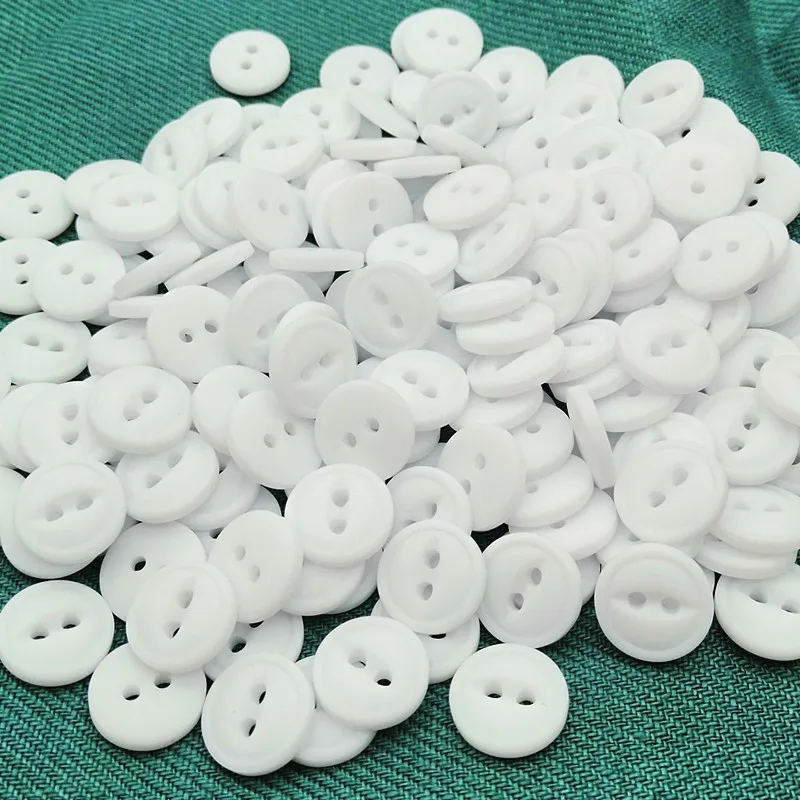 18L 11.5mm 2 holes fish eye resin button with rim in dull white color, dyeable resin button