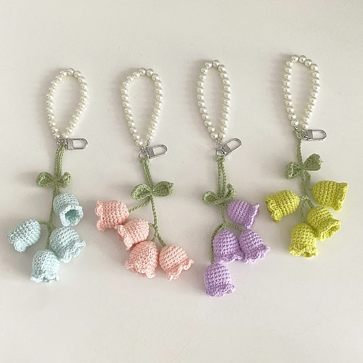 Korean style creative cute girl pearl chain wool crochet Lanling flower string keychain