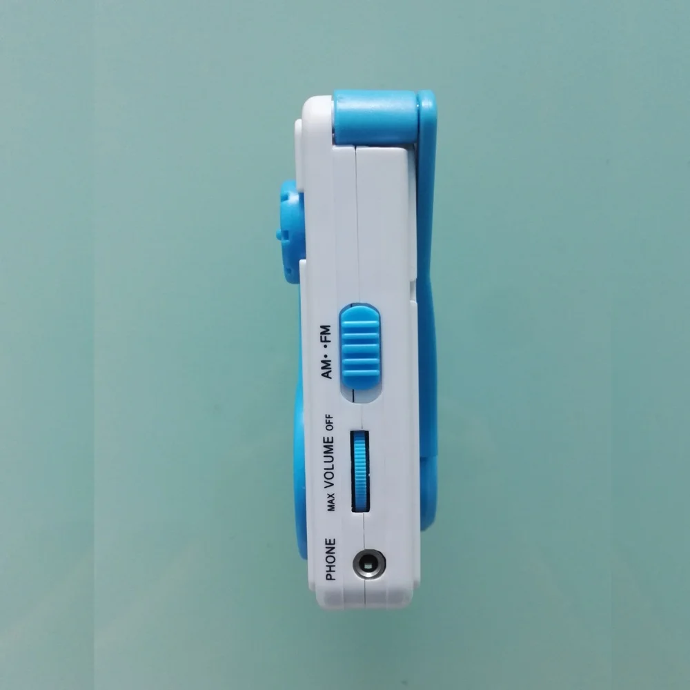 
self-powered LED light radio with phone charger Hand shake mini pocket size crank dynamo light radio flashlight torch 