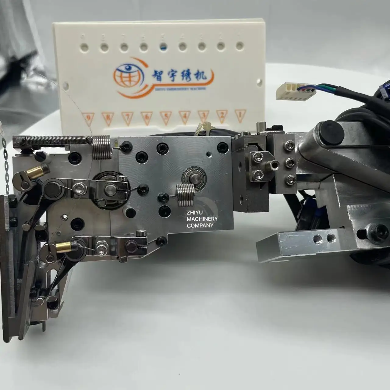 Embroidery machine sequin device