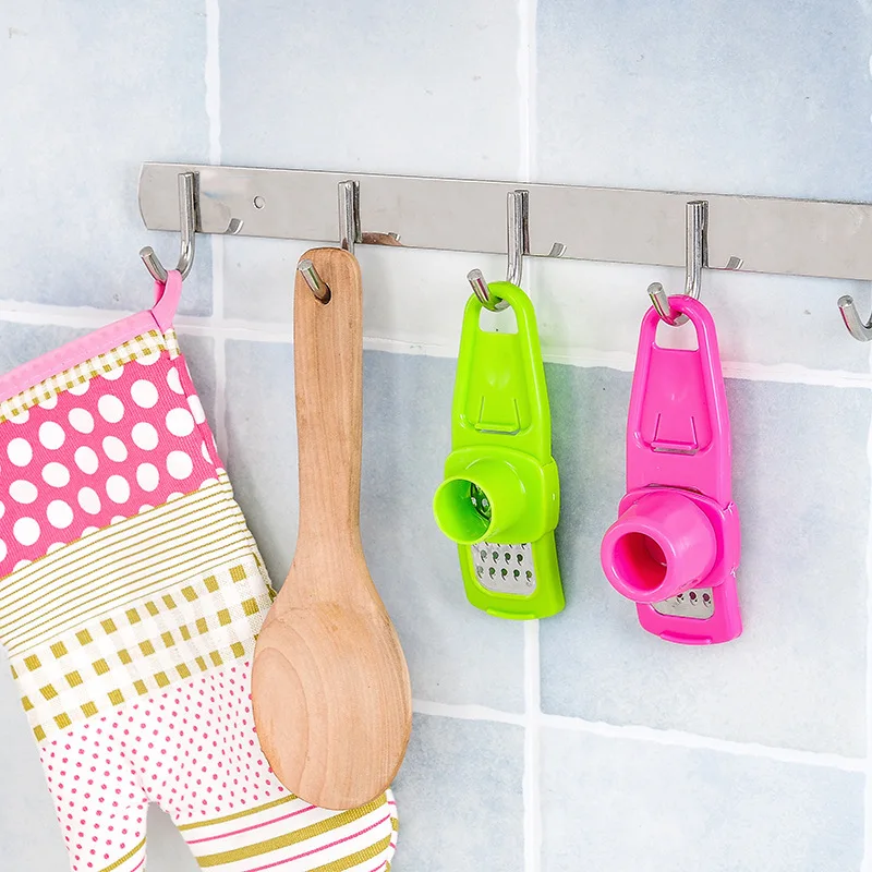 Explosive hot selling kitchen household garlic grinder creative multifunctional ginger grinder and garlic cutter wholesale