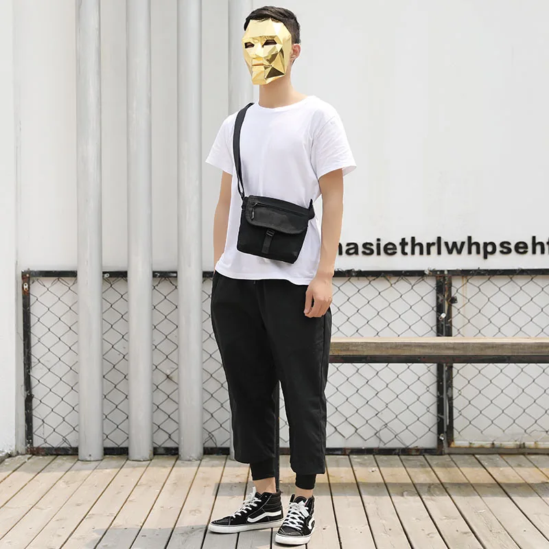 Japanese style pure color contracted cross-body bag men and women mini one-shoulder bag out of the backpack