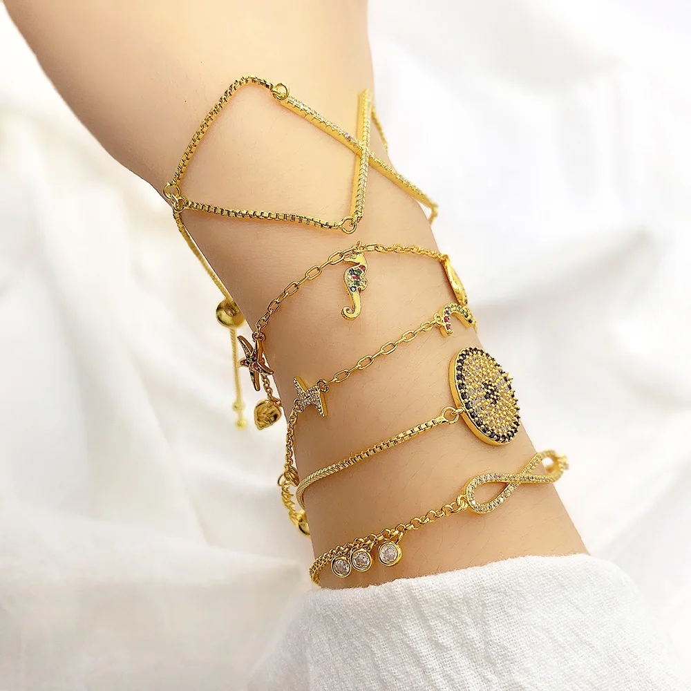 Wholesale Turkish gold plated bracelet iced out diamond Cross shell conch star flash eye Charms bracelet