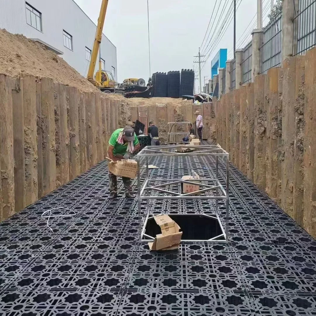 Landscaping garden rainfall collection geocellular modular detention attenuation tank under vehicle driveway and car parking lot