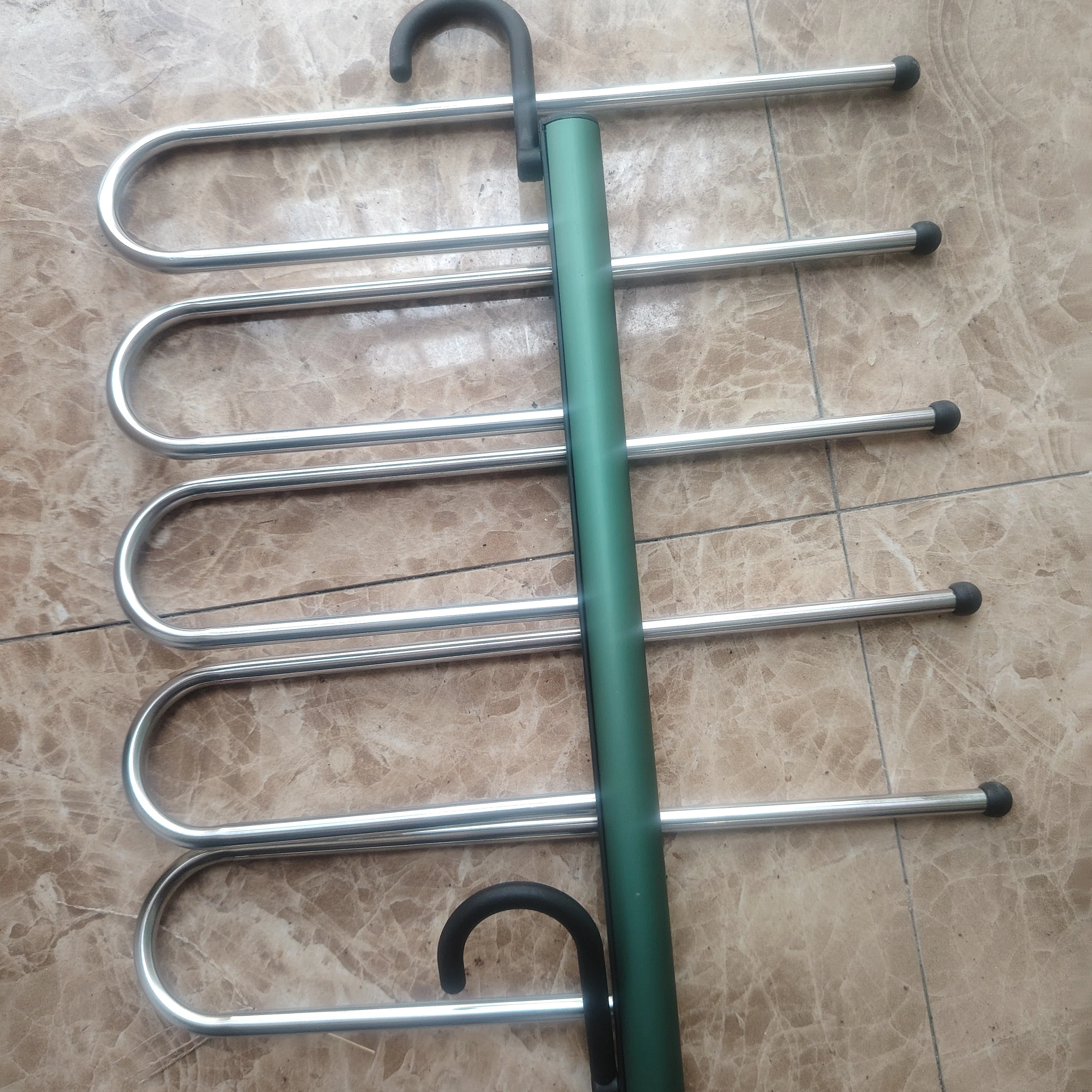 Hot selling space saving seamless telescopic folding multifunctional trouser rack home magic wardrobe storage rack meta