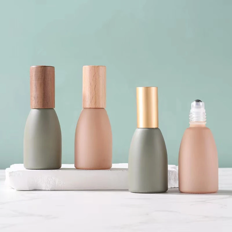 Custom Wholesale 12ml Essential Oil Morandi Colors Roller on Glass Bottle Perfume Roll-On Bottle With Wood Lid