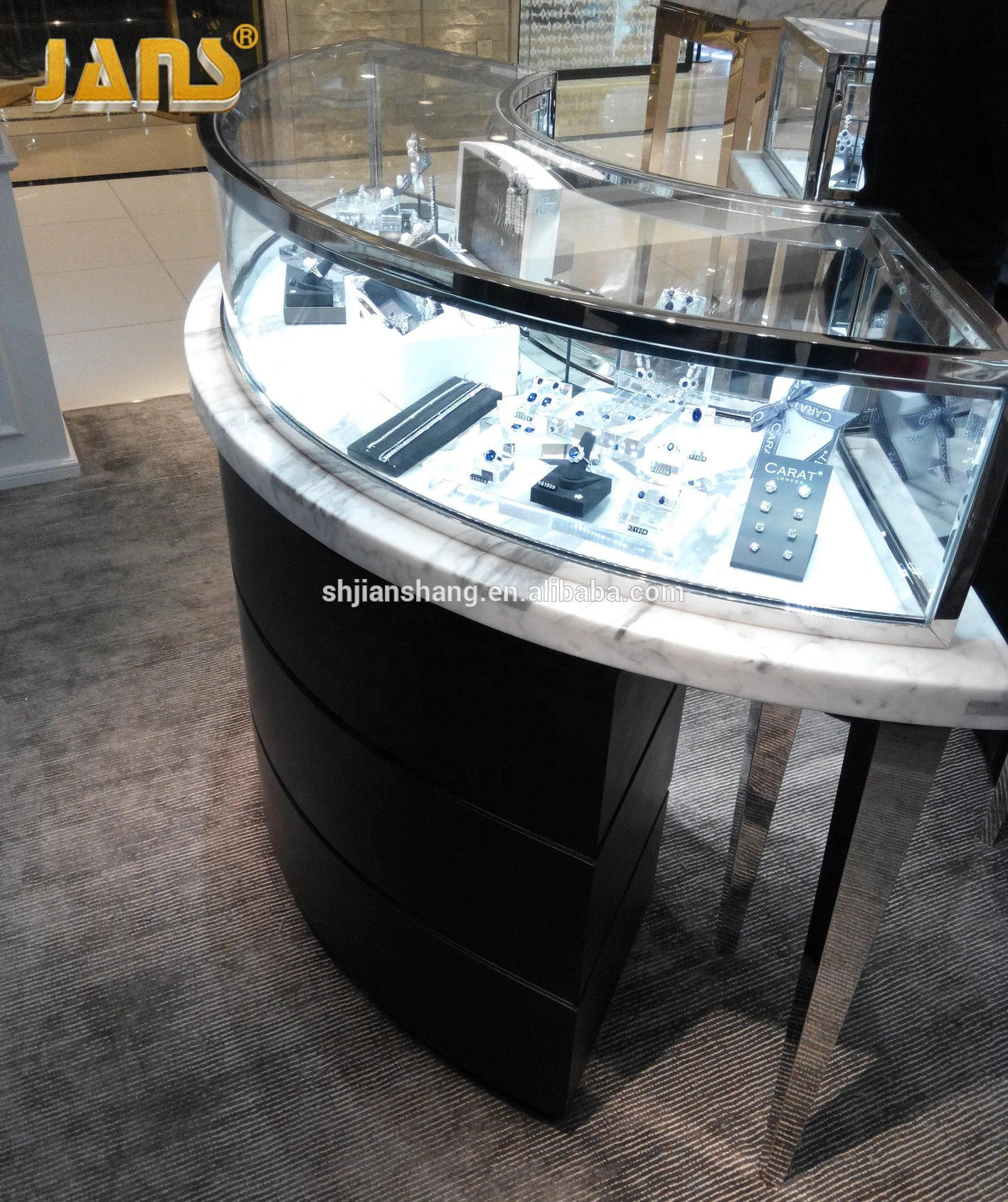 
Luxury high-grade marble curved glass jewelry display cabinet showcase with LED light 