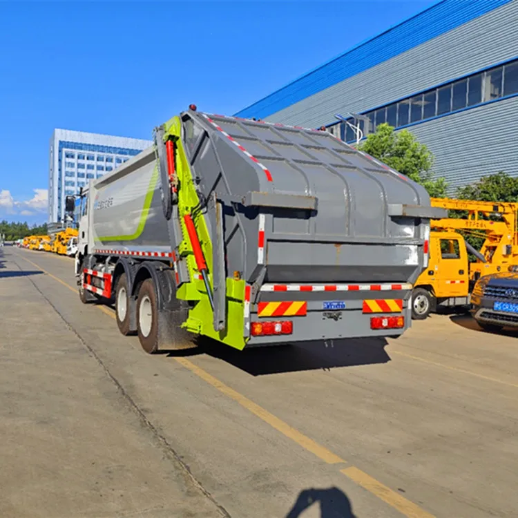 Compacting garbage truck.jpg