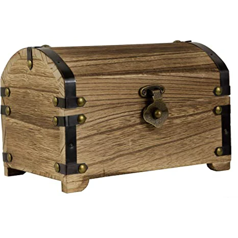 Decorated retro wooden treasure chest in natural wood-burning style with decorative metal profile and metal hinges