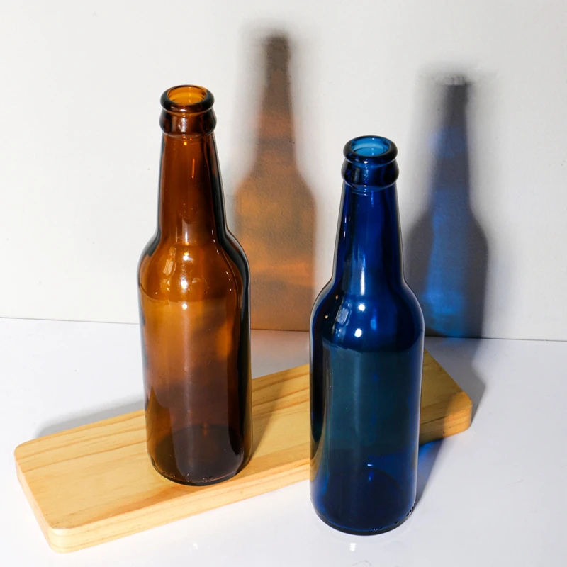 Custom Color and Logo Sparkling Water Packaging Juice Soda Beverage Amber Glass Beer Bottle With Crown Cap