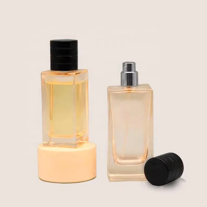 Hot Sale Recyclable Clear Square Transparent Flat Shoulder Perfume Spray Glass Bottle with Black Lid 100ml