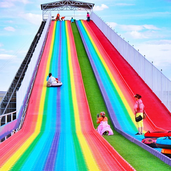 Outdoor rainbow dry snow slide for children and adult to have fun