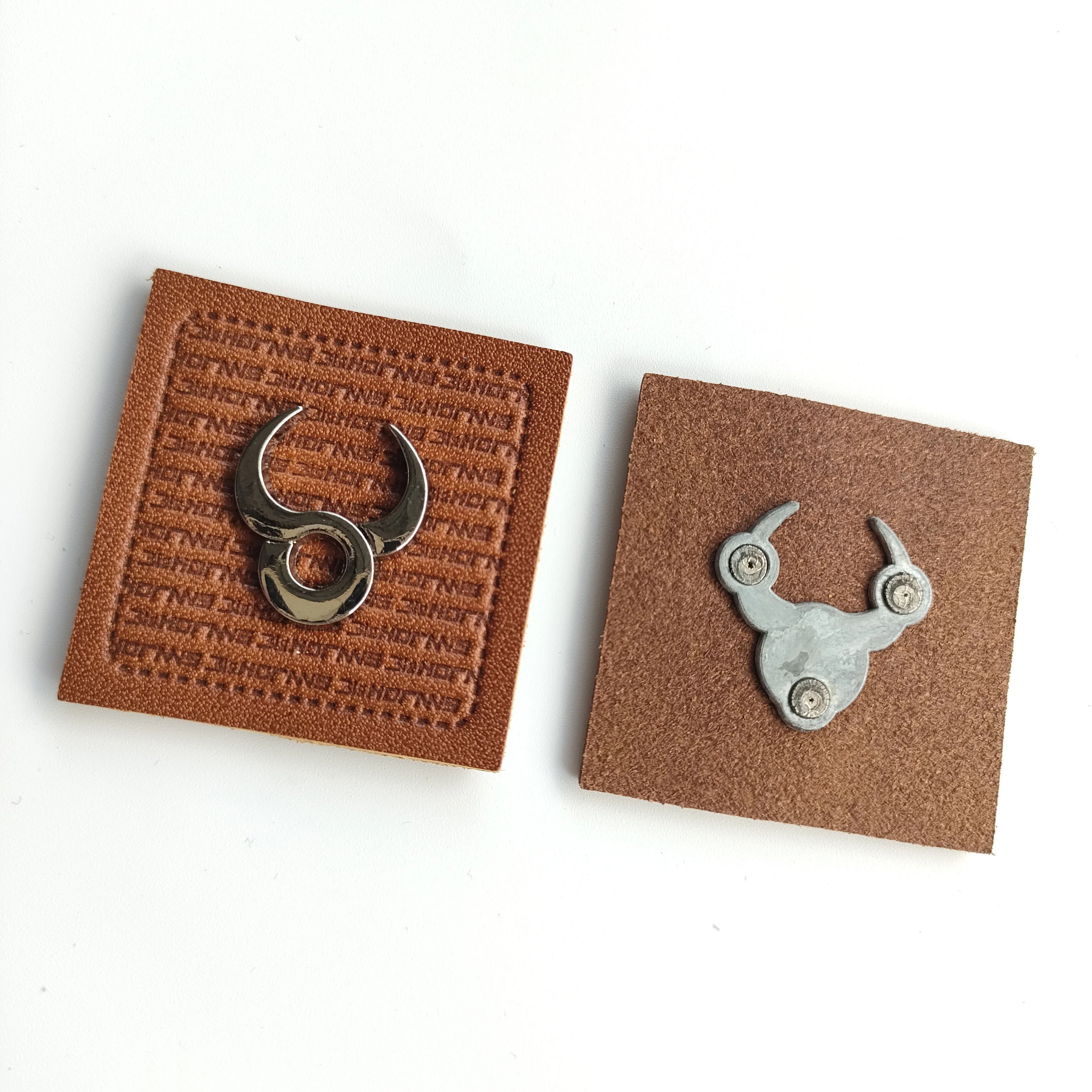 Factory custom clothing metal accessories pants bull head badge PU leather hardware label logo design