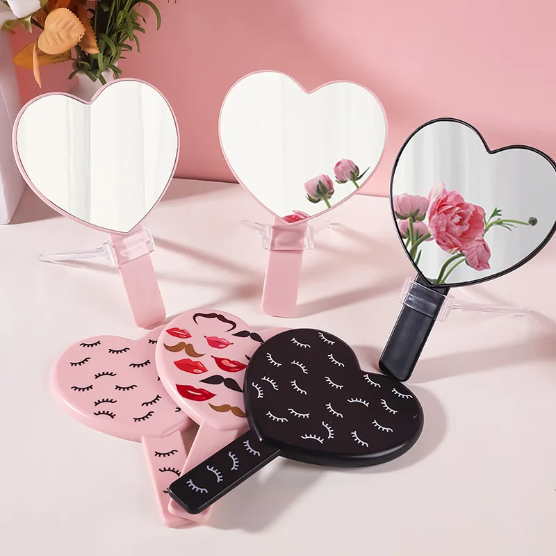 Small heart-shaped pink handheld makeup mirror beauty salon barber plastic hand mirrors portable heart-shaped mirrors for pocket