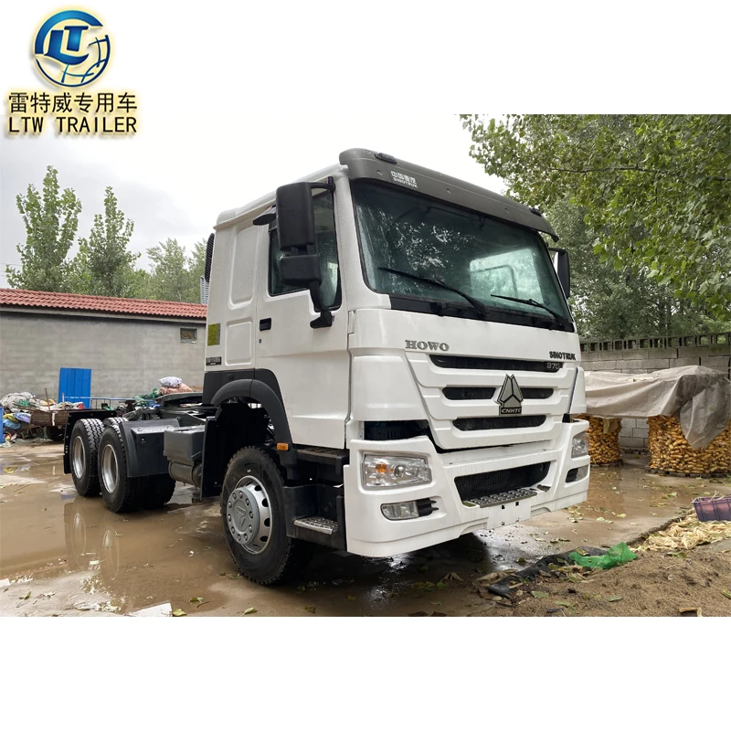 Sinotruck Rhd or LHD euro2  Diesel Engine 375HP Used HOWO sino cargo truck 6X4 Tractor Truck for sale
