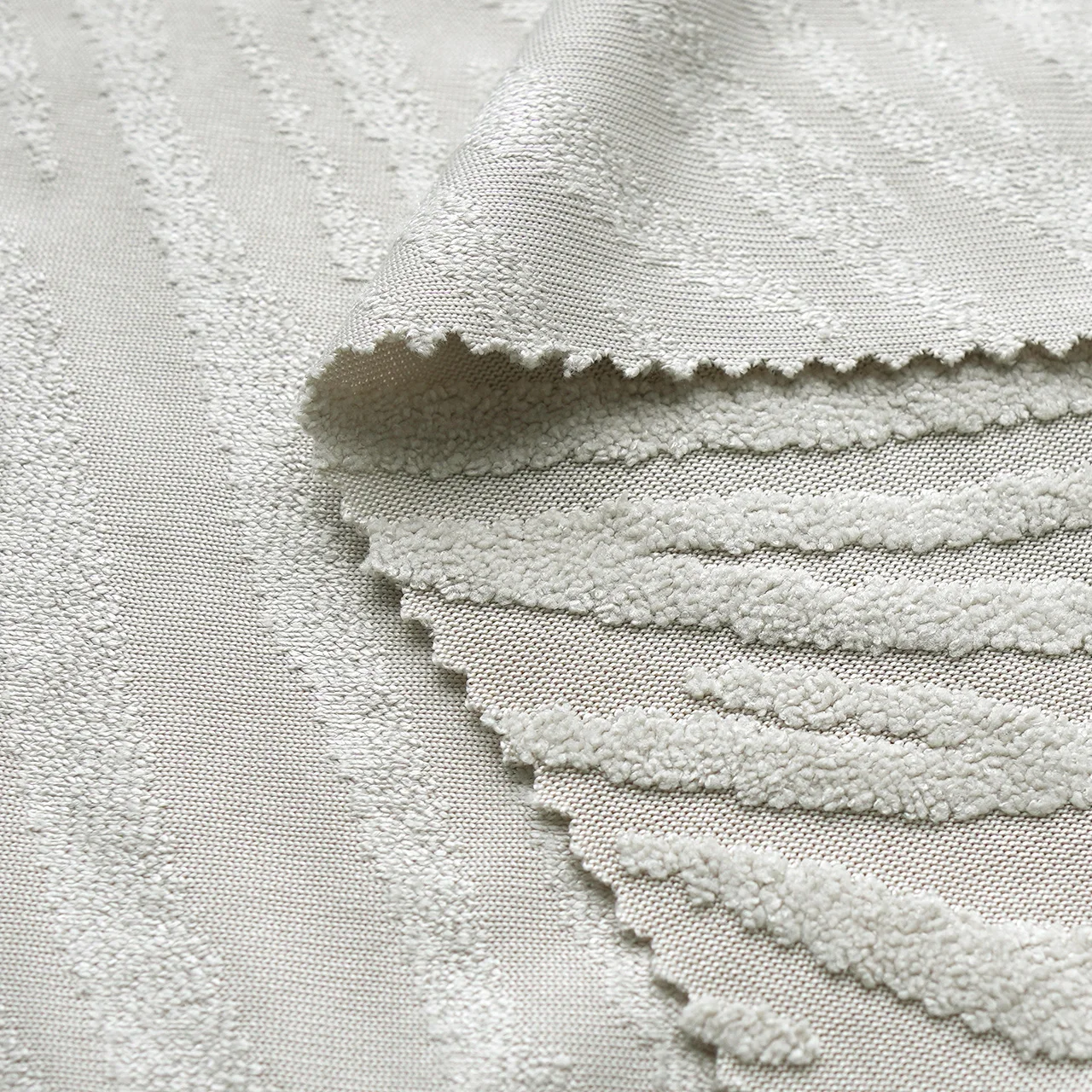 Hot selling 296GSM light gray fleece polyester knitted jacquard fabric suitable for clothing, home decoration, etc