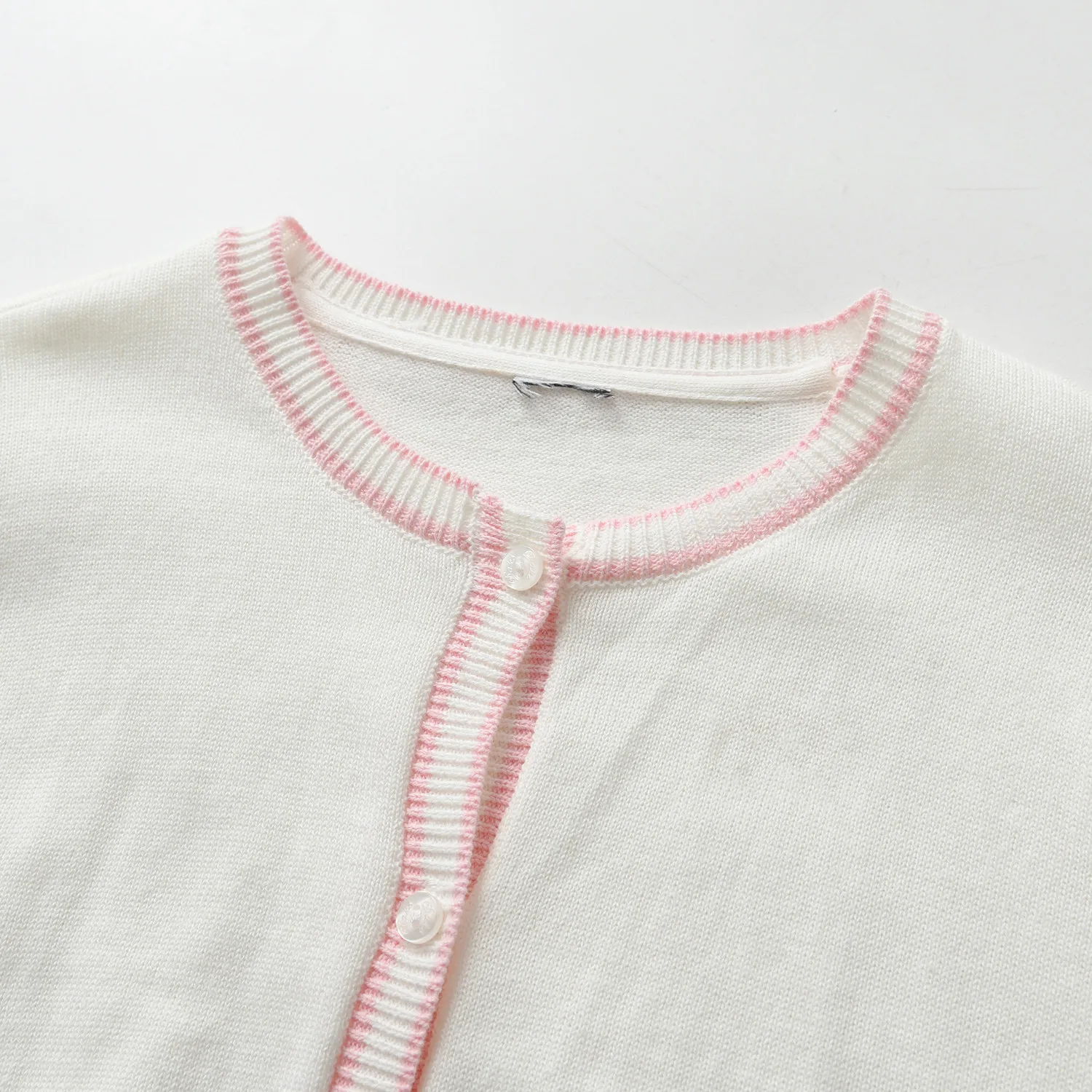 Custom ODM OEM Kids White Knitted Cardigan Organic Cotton Long Sleeve Bow Design With Button Baby Knit Sweater