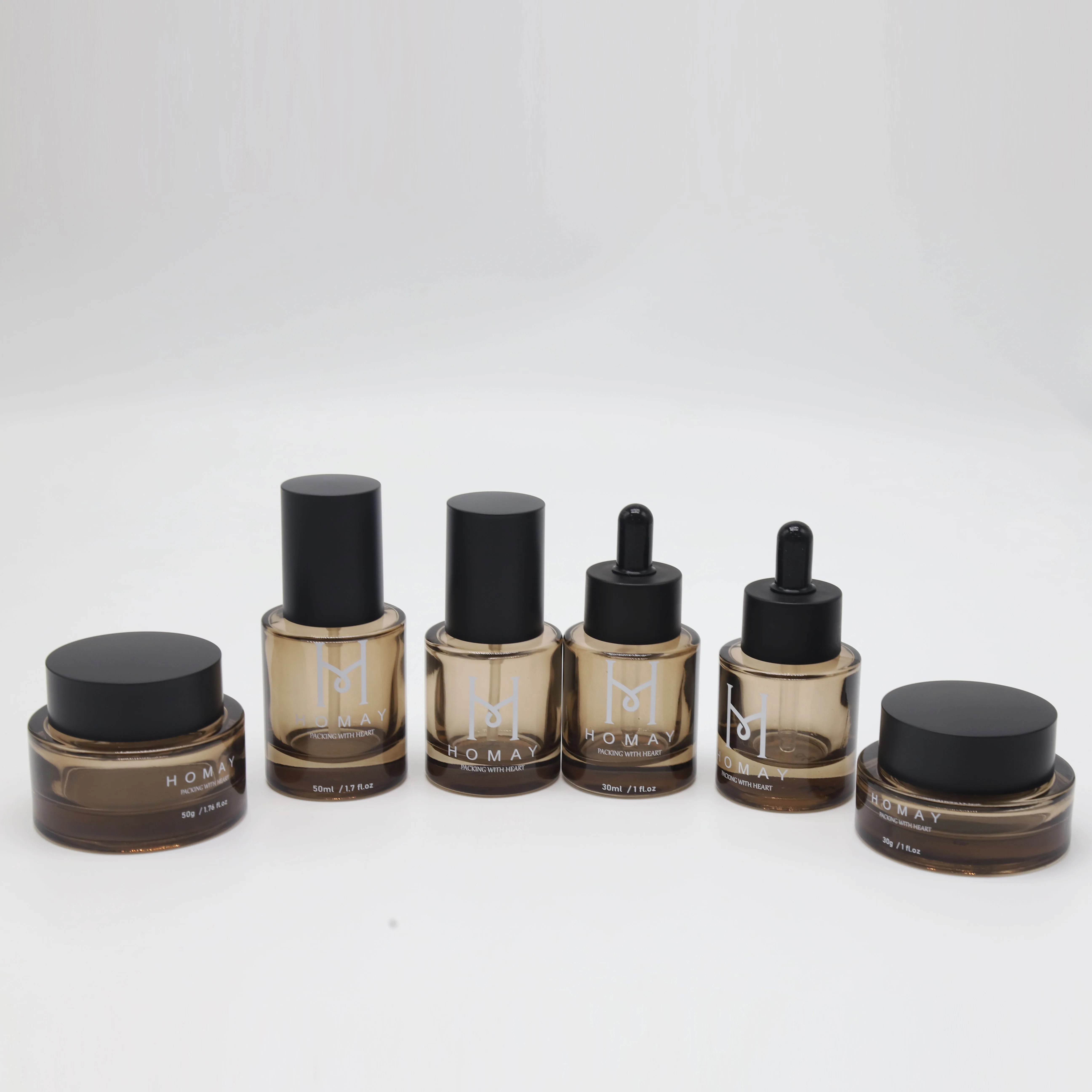 Homay packaging high ended 10ml 20ml 30ml 50ml 100ml amber glass lotion bottle set for facial care products