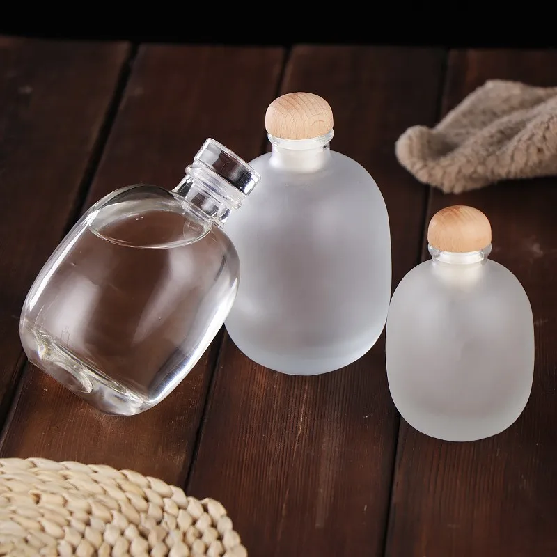 Customized 250ml 500ml Transparent Frosted Heavy Bottom Boston Liquor Beverage Fruit Wine Glass Bottle With Cork