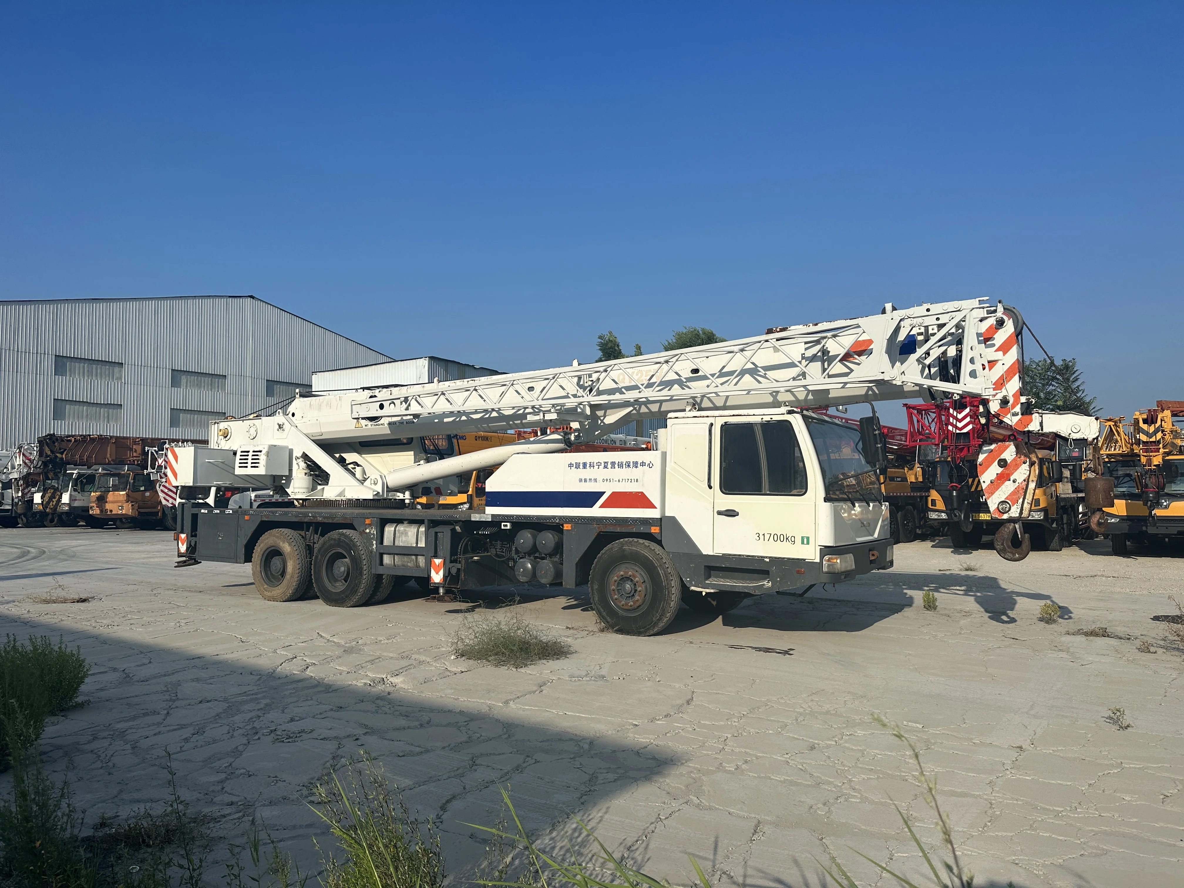 Truck Crane With Price 25 Ton Hydraulic Telescopic Boom Lifting Crane For Construction Machine