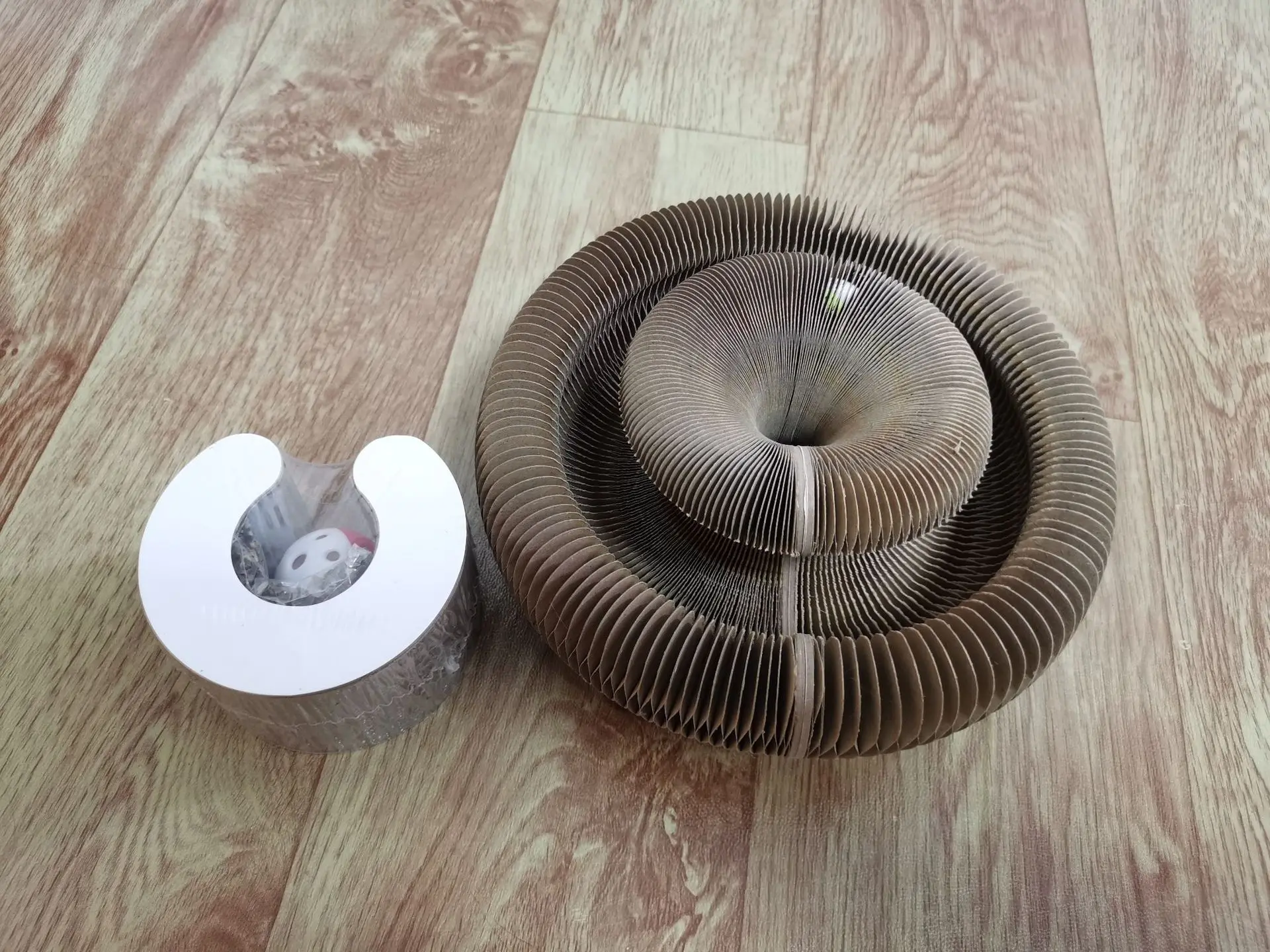 2022 Newest Magic Organ Cat Scratching Board with Toy Bell Retractable Cat Scratcher Board Foldable Cat Scratch Pad