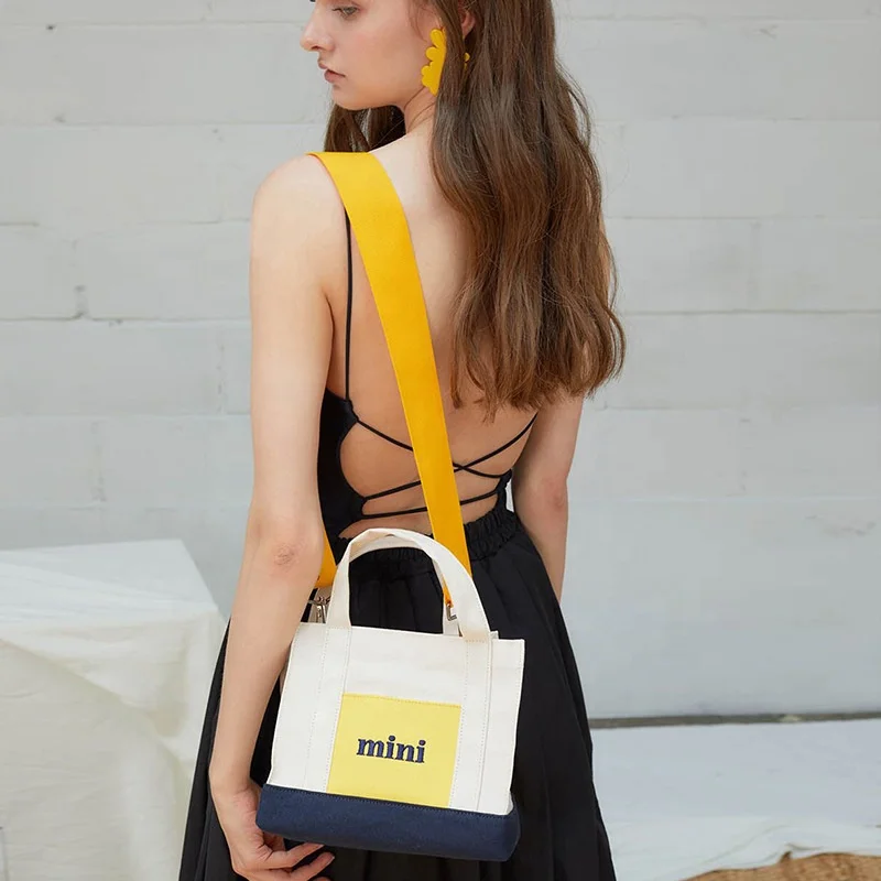 hot sale small natural soft cotton fabric black school bag supplier as graduation gift