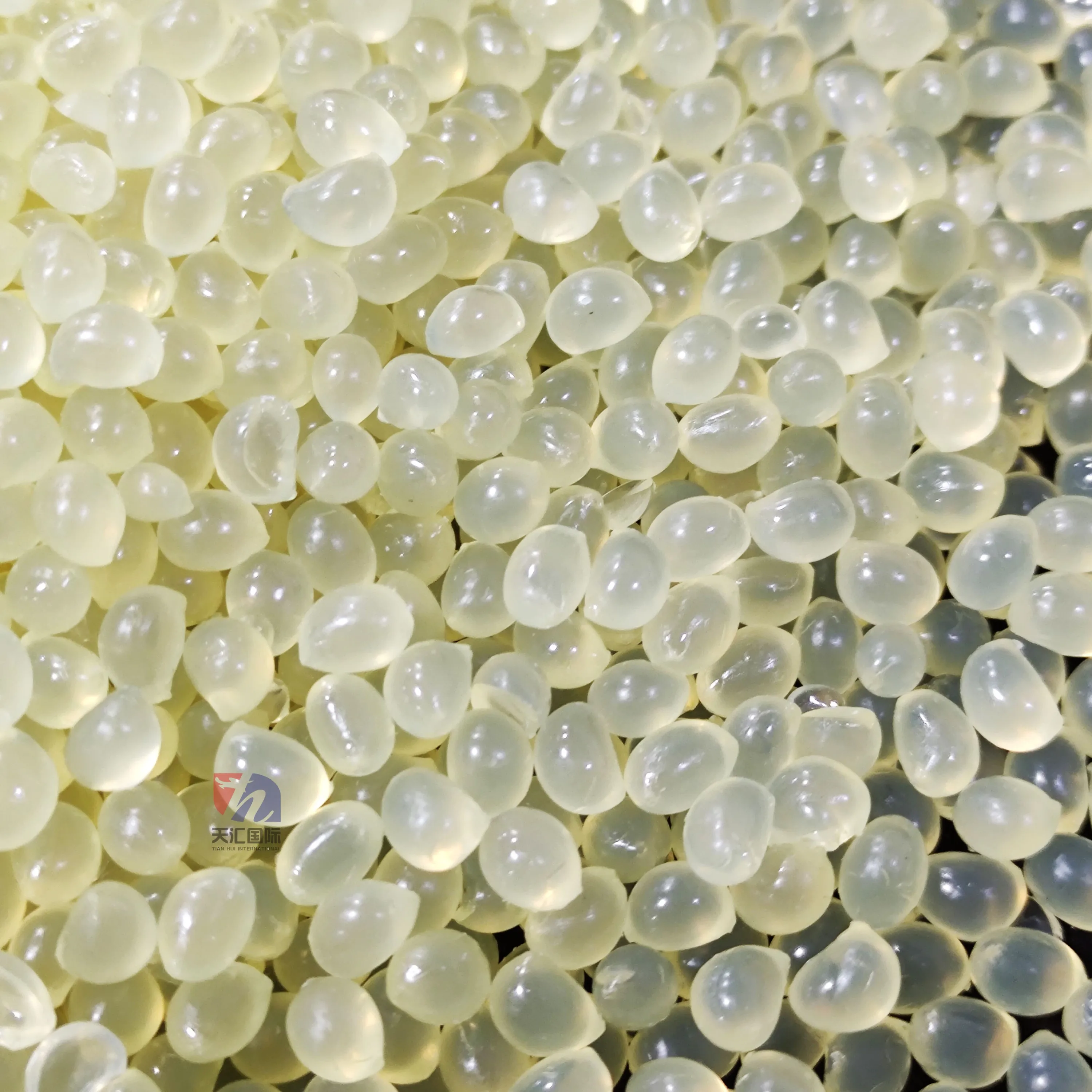 EVA yellow translucent hot melt adhesive for paper packaging sealing high bonding strength non woven product hotmelt glue pellet