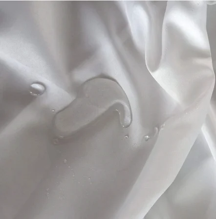 
100% Polyester Plain Dyed Solid taffeta Fabric with PE film For Disposable civil protective clothes 