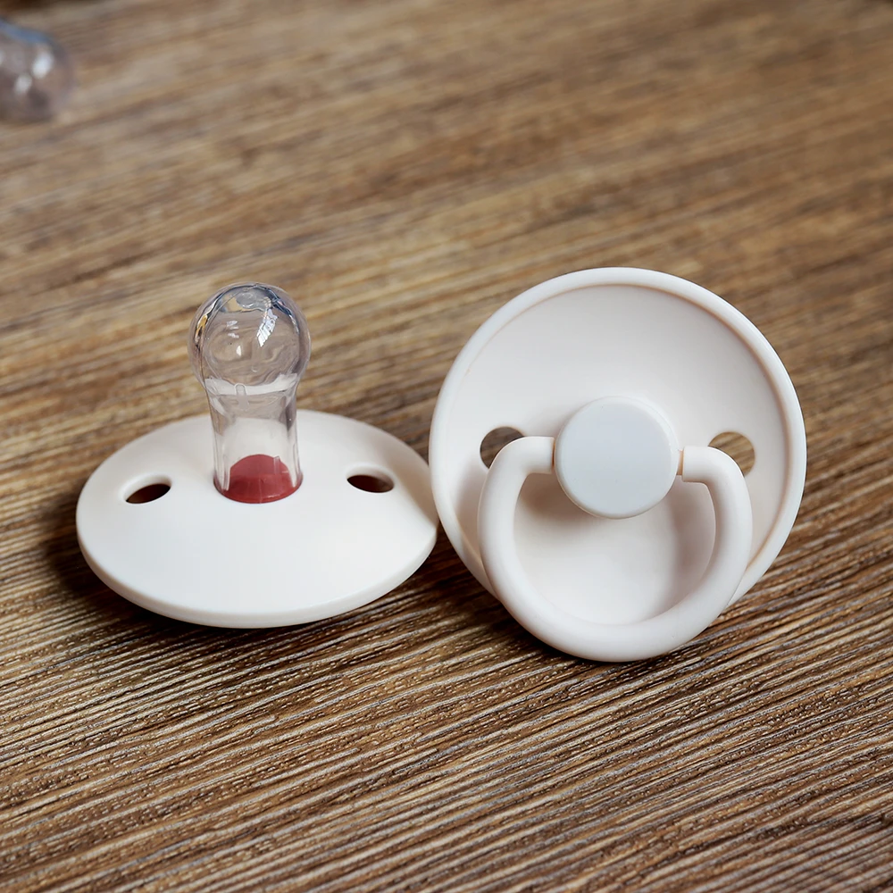 Custom bpa-free soft feeding baby food grade natural silicone neutral color soothers pacifier wholesale