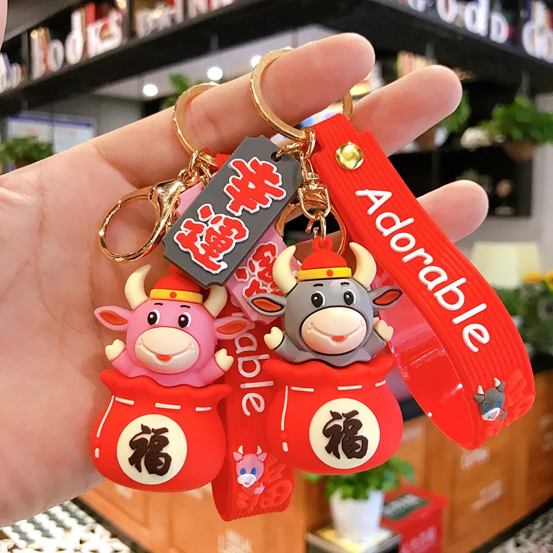 
New year Lucky Bull Keychain cute cartoon custom logo 3D soft pvc rubber keychains key chain car keychain Lucky Bull Pendant 