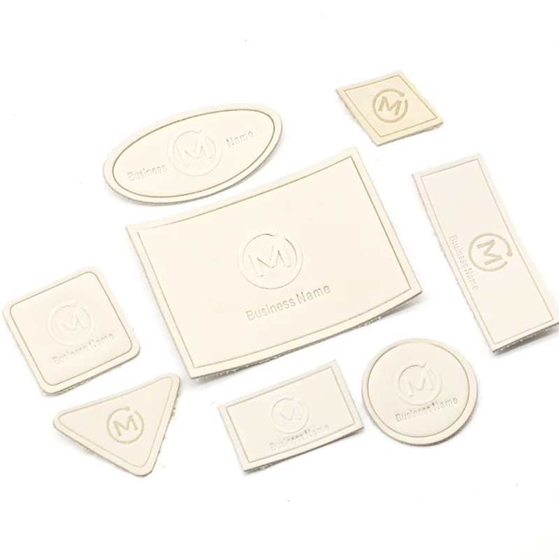 Best Price Custom Shape Embossed Brand Triangle Round Rectangle Clothing Tag Metal Casting Pu Leather Patches