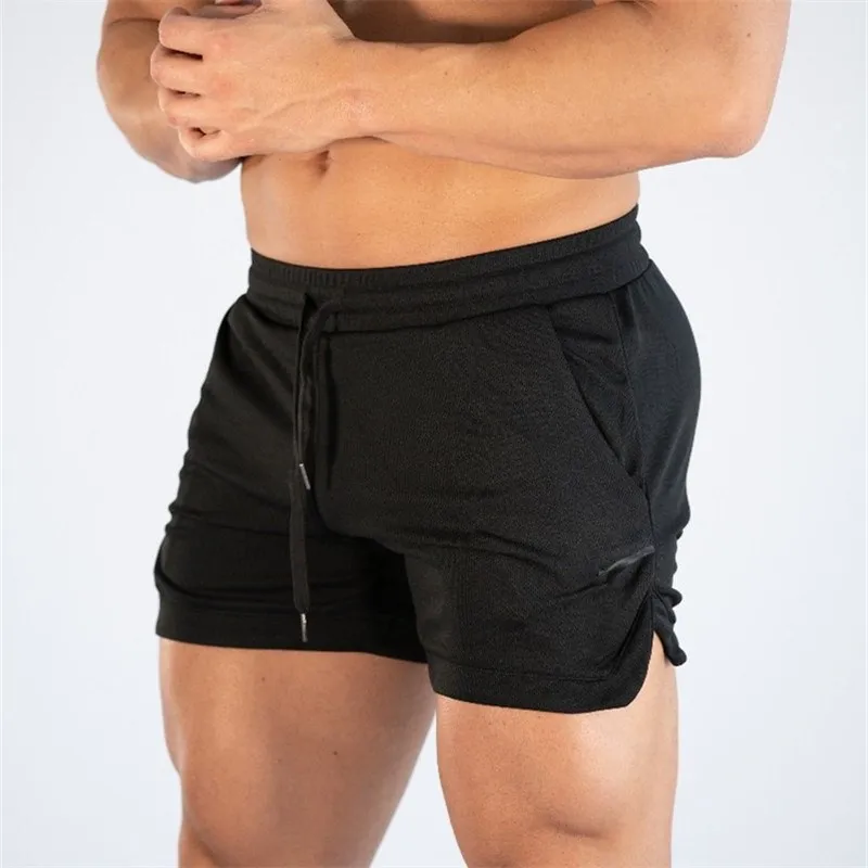 Summer Gyms Workout Male Breathable Mesh Quick Dry Sportswear Jogger Beach Solid Shorts Men Fitness Bodybuilding Shorts