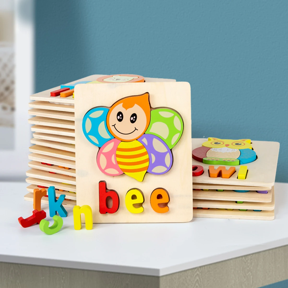 
Hot sale cartoon letter intellectual educational toy creative animal jigsaw puzzle wooden toy 3d childern mini laser puzzle 